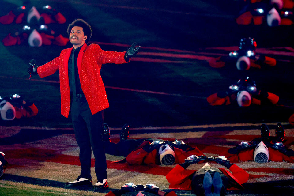 <p>TAMPA, FLORIDA - FEBRUARY 07: The Weeknd performs during the Pepsi Super Bowl LV Halftime Show at Raymond James Stadium on February 07, 2021 in Tampa, Florida. (Photo by Kevin C. Cox/Getty Images)</p> 