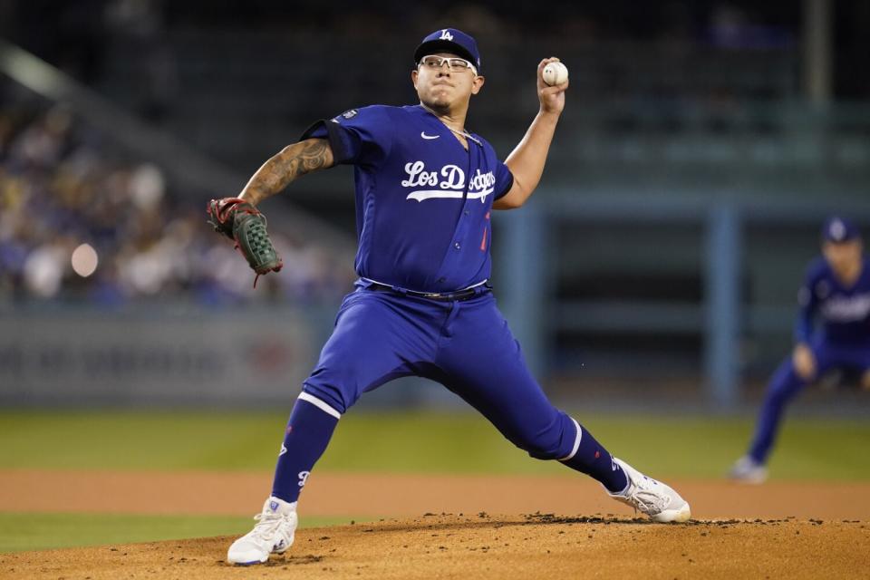 Dodgers starting pitcher Julio Urías throws during the first inning against the Arizona Diamondbacks.