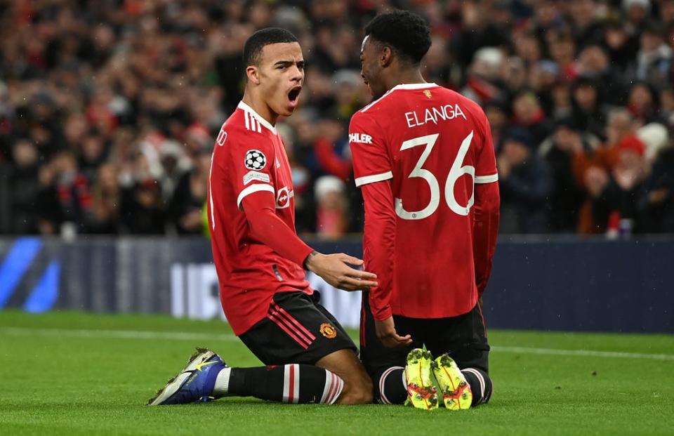 Mason Greenwood celebrates with Anthony Elanga after putting Manchester United ahead against Young Boys at Old Trafford on Wednesday  (Getty)