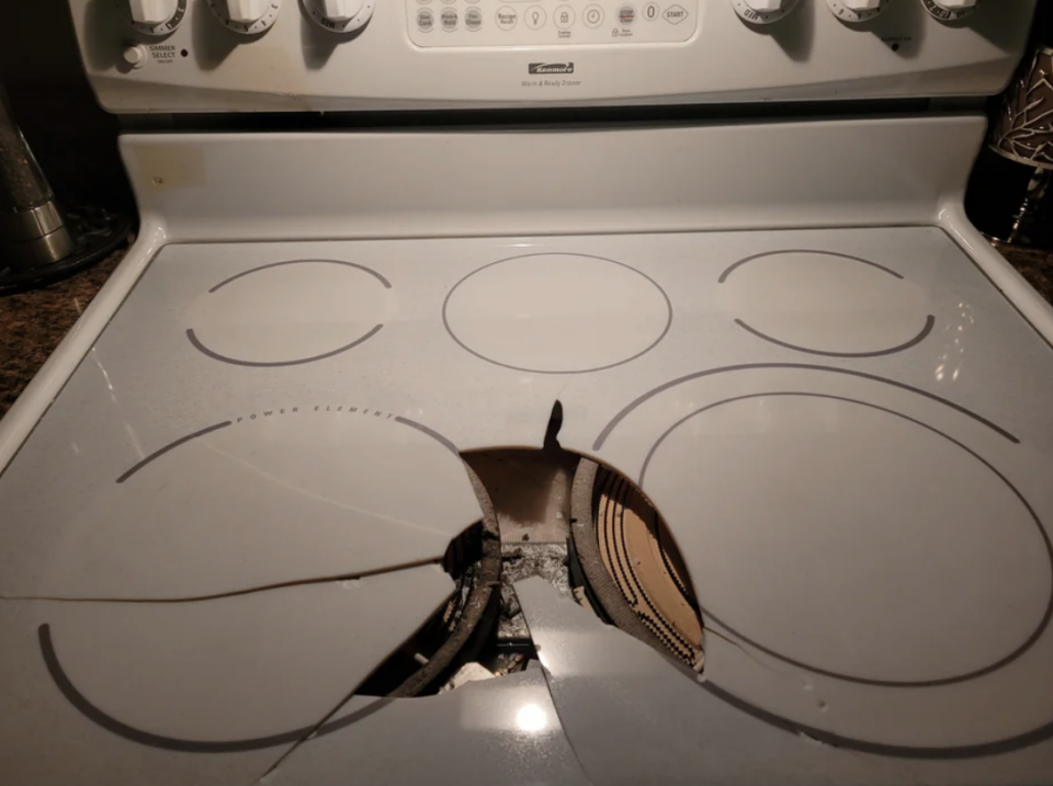 Ceramic hob with broken heating element and visible damage