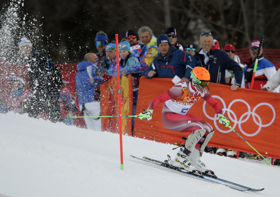 Men's supercombined gold medal winner Switzerland's Sandro Viletta finishes the slalom portion of the event at the Alpine ski venue at the Sochi 2014 Winter Olympics, Friday, Feb. 14, 2014, in Krasnaya Polyana, Russia. (AP Photo/Charles Krupa)