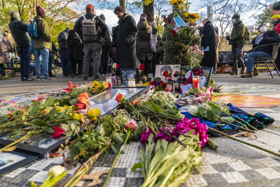 People gathered around Strawberry Field Imagine mosaic in Central Park in New Yokr on december 8, 2020 to remember John Lennon 40 years after his death. John Lennon was killed 40 years on this day of December 8. (Photo by Lev Radin/Sipa USA)