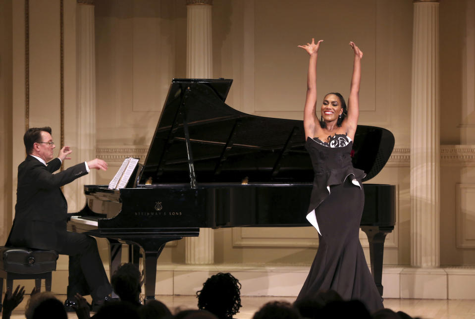 In this Dec. 13, 2018, photo provided by Carnegie Hall, J'nai Bridges, a mezzo-soprano, performs in her recital, accompanied by Mark Markham on piano, at Weill Recital Hall in Carnegie Hall in New York. (Carnegie Hall via AP)
