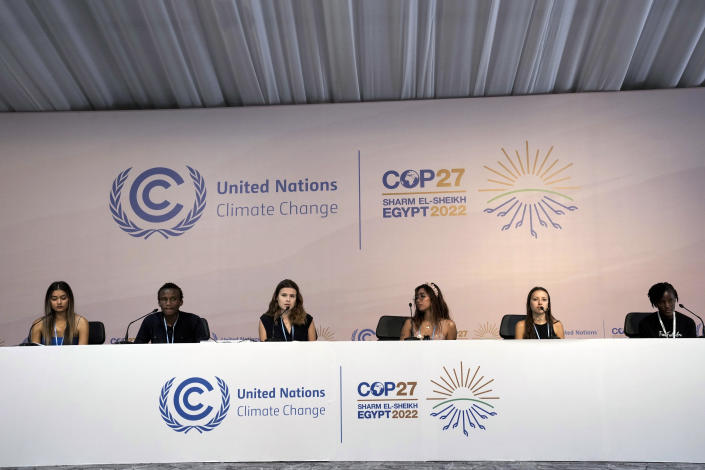 Youth climate activists from right, Vanessa Nakate, of Uganda, Nicole Becker, of Argentina, Mitzi Jonelle Tan, of the Philippines, Luisa Neubauer, of Germany, Eric Njuguna, of Kenya, and Sophia Kianni, an Iranian-American environmentalist, participate in a panel at the COP27 U.N. Climate Summit, Wednesday, Nov. 9, 2022, in Sharm el-Sheikh, Egypt. (AP Photo/Nariman El-Mofty)