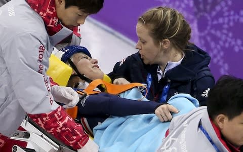 Elise Christie is stretchered off - Credit: Getty images