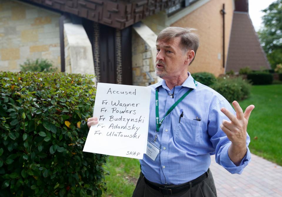 David Clohessy, of St. Louis, who is the Missouri director and former national director of the Survivors Network of those Abused by Priests, holds a list of Catholic priests who have been credibly accused of sexual abused and have spent time in the Diocese of La Crosse in September 2019 at St. Michael's Catholic Church in Wausau, Wisconsin.
