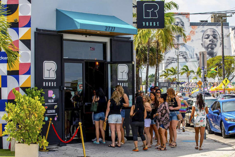 Image: People wait in line to check into their reservations for a Drag Brunch at R House Wynwood on April 9, 2022 in Miami, Fla. (Daniel A. Varela / Tribune News Service via Getty Images)