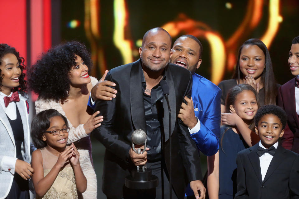 Kenya Barris with the cast of Black-is on stage.