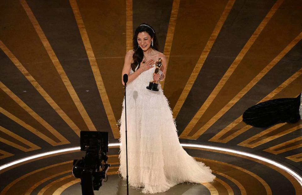 topshot malaysian actress michelle yeoh accepts the oscar for best actress in a leading role for everything everywhere all at once onstage during the 95th annual academy awards at the dolby theatre in hollywood, california on march 12, 2023 photo by patrick t fallon afp photo by patrick t fallonafp via getty images
