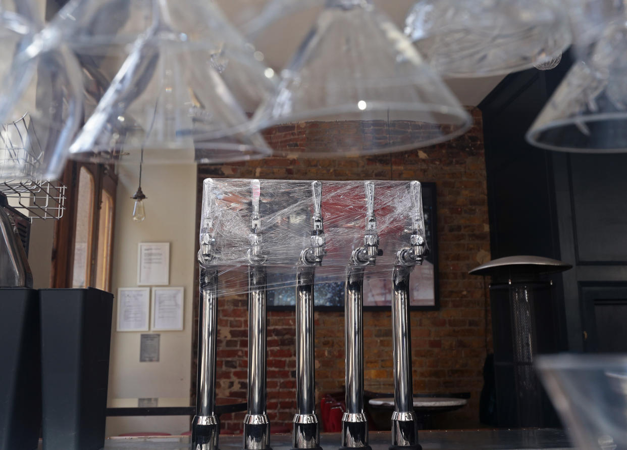 The empty interior of a pub which remains closed due to the coronavirus pandemic, in Marylebone, London, after the introduction of measures to bring the country out of lockdown.