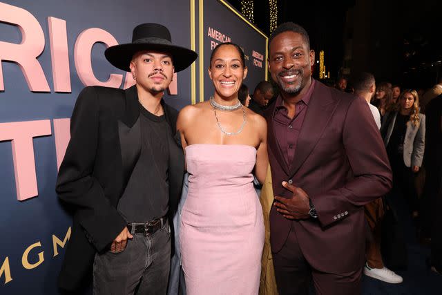 <p>Eric Charbonneau/Getty</p> Sterling K. Brown with 'American Fiction' costar Tracee Ellis Ross and Evan Ross