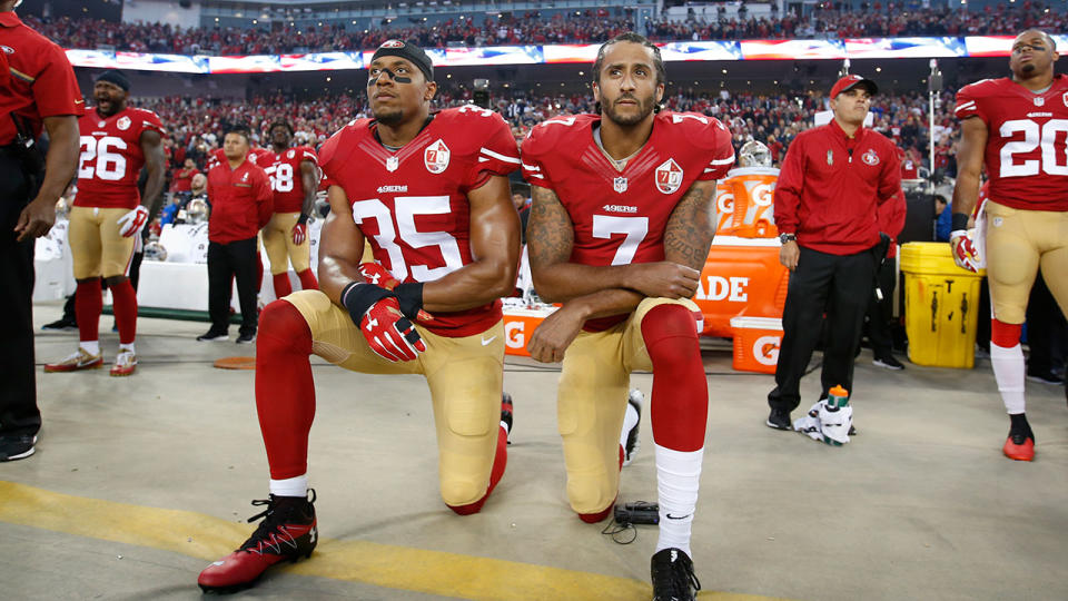 Eric Reid #35 and Colin Kaepernick #7 of the San Francisco 49ers kneel during the anthem prior to the game against the Los Angeles Rams at Levi Stadium on September 12, 2016 in Santa Clara, California. The 49ers defeated the Rams 28-0. (Photo by Michael Zagaris/San Francisco 49ers/Getty Images)