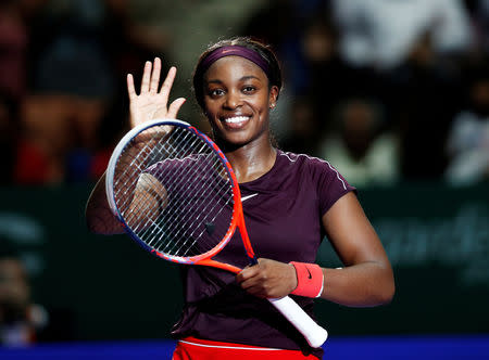 Tennis - WTA Tour Finals - Singapore Indoor Stadium, Kallang, Singapore - October 22, 2018 Sloane Stephens of the U.S. celebrates winning her group stage match against Japan's Naomi Osaka REUTERS/Edgar Su