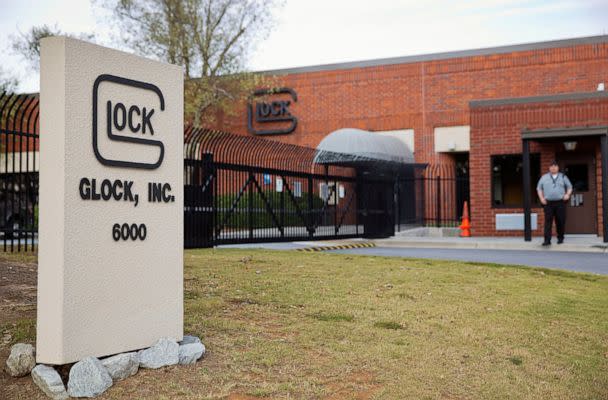 PHOTO: In this Oct. 8, 2014 file photo, a security guard stands outside the Glock, Inc. headquarters in Smyrna, Ga. (David Goldman/AP, FILE)