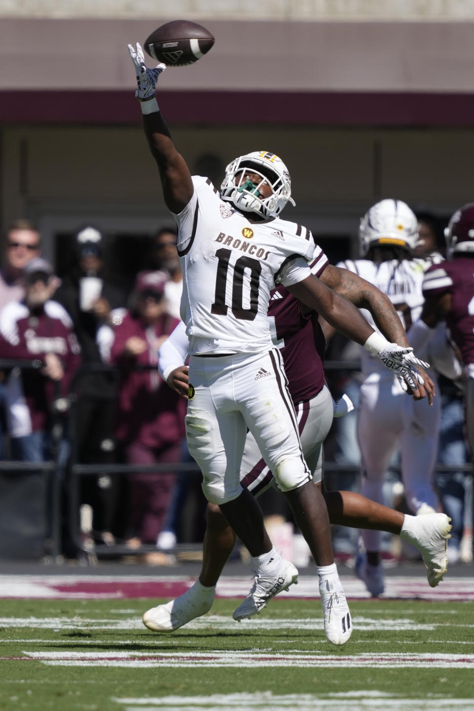 Western Michigan running back Zahir Abdus-Salaam (10) reaches for an overthrown pass against Mississippi State during first half of an NCAA college football game, Saturday, Oct. 7, 2023, in Starkville, Miss. (AP Photo/Rogelio V. Solis)