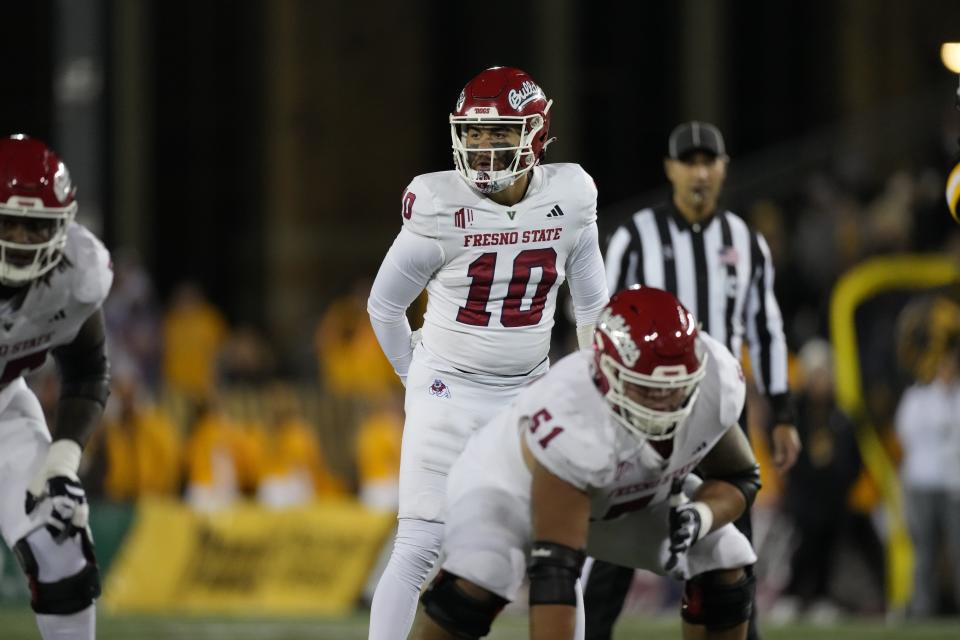 Fresno State quarterback Logan Fife prepares for a snap during a game against the Cowboys Saturday, Oct. 7, 2023, in Laramie, Wyo. Fife could be the next man up this week after starting Bulldogs QB Mikey Keene suffered an ankle injury. | David Zalubowski, Associated Press