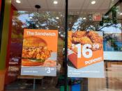 Signs advertising menu items are seen at fast food restaurants in New York City