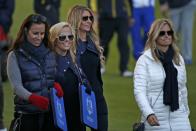 Team U.S. wives (L-R) Sybi Kuchar, Amy Mickelson, Jillian Stacey and Tabitha Furyk watch play during foursomes 40th Ryder Cup matches at Gleneagles in Scotland September 26, 2014. REUTERS/Russell Cheyne (BRITAIN - Tags: SPORT GOLF)