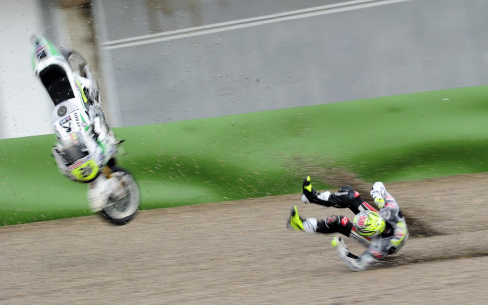 LCR Honda MotoGP's Spanish Toni Elias falls during the MotoGP's second practice session at Valencia's MotoGP Grand Prix at Ricardo Tormo race track in Cheste near Valencia on November 4, 2011. AFP PHOTO/JAVIER SORIANO (Photo credit should read JAVIER SORIANO/AFP/Getty Images)