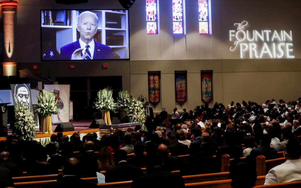 Former Vice President Joe Biden gives a video-taped message during the funeral for George Floyd at The Fountain of Praise church in Houston, Texas - Shutterstock