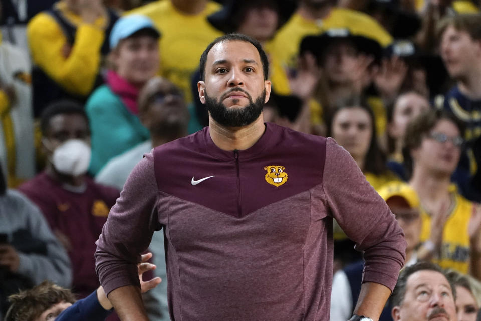 Minnesota head coach Ben Johnson watches against Michigan in the second half of an NCAA college basketball game in Ann Arbor, Mich., Sunday, Jan. 22, 2023. (AP Photo/Paul Sancya)