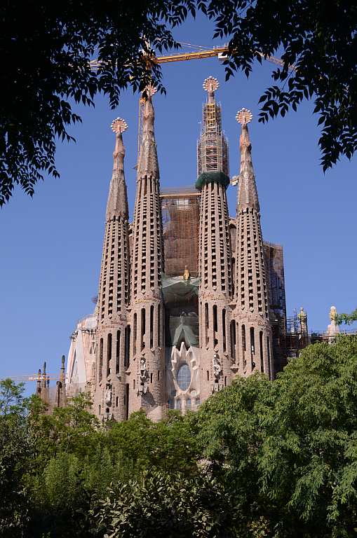 Sagrada Familia, Barcelona Spain Sagrada Familia is unlike any other basilica I have seen in the world. It has been under construction since 1882. Designed by maverick architect Antoni Gaudi, this masterpiece is a living monument and a testimony to the architect’s style. It is is one of the key landmarks of Barcelona. The Nativity Façade, which shows images from Christ’s birth, has the architectural stamp of Gaudi in its symbolism. It represents Christmas and is referred to as the Façade of Life. It is a fusion of Gothic and Art Nouveau. While many debate over the style and the ornate design of the monument, Sagrada Familia continues to be built with donations from people even after 130 years. View a slideshow about Sagrada Familia http://in.lifestyle.yahoo.com/photos/sagrada-familia-barcelona-s-great-living-basilica-slideshow/