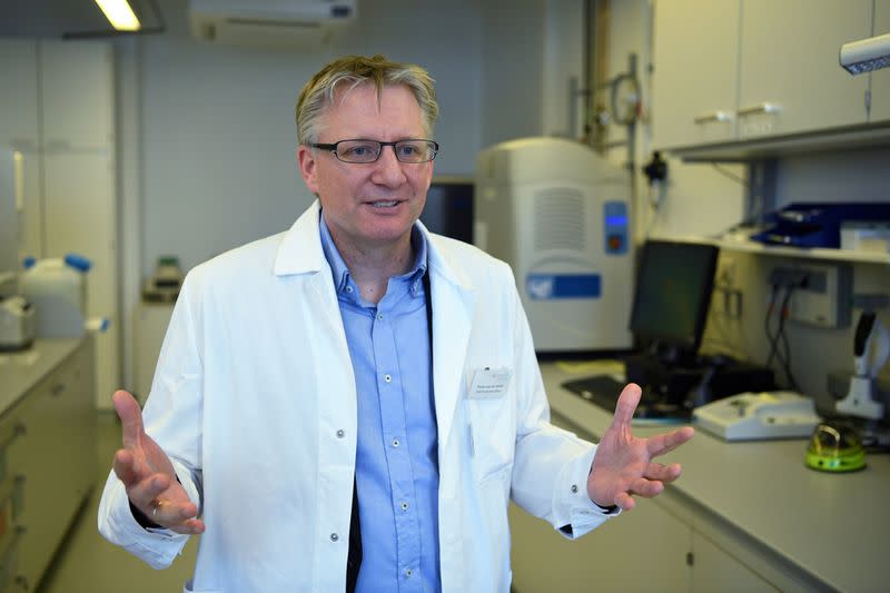 FILE PHOTO: Florian von der Muelbe, COO of German biopharmaceutical company CureVac, explains the company’s research on a vaccine for the coronavirus (COVID-19) disease at a laboratory in Tuebingen