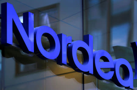 FILE PHOTO: The Nordea bank logo is seen outside their corporate headquarters in Stockholm, Sweden, February 2, 2011. REUTERS/Bob Strong/File Photo