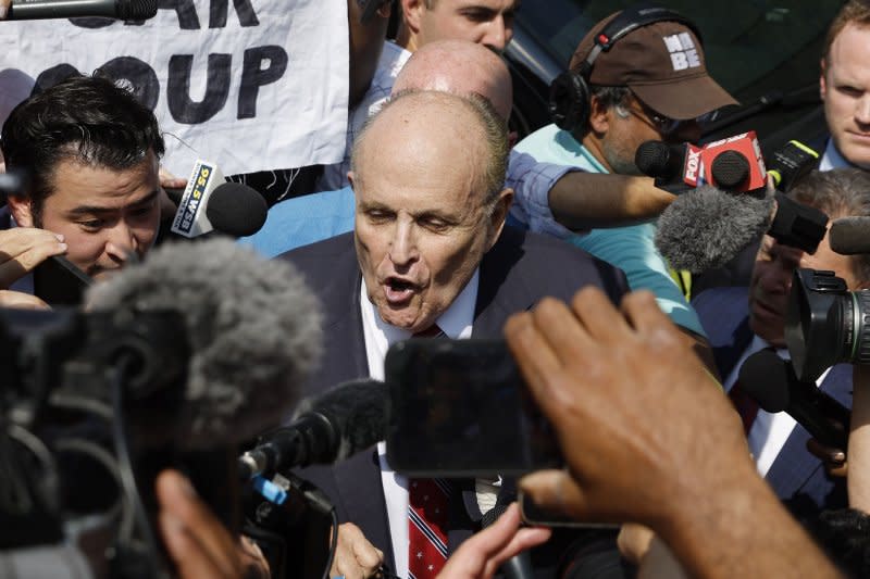 Former New York mayor and Donald Trump's personal attorney Rudy Giuliani (C) speaks to reporters outside the Fulton County Jail following his surrender and release on a $150,000 bond in Atlanta, Ga., on Wednesday. Photo by Erik S. Lesser/EPA-EFE