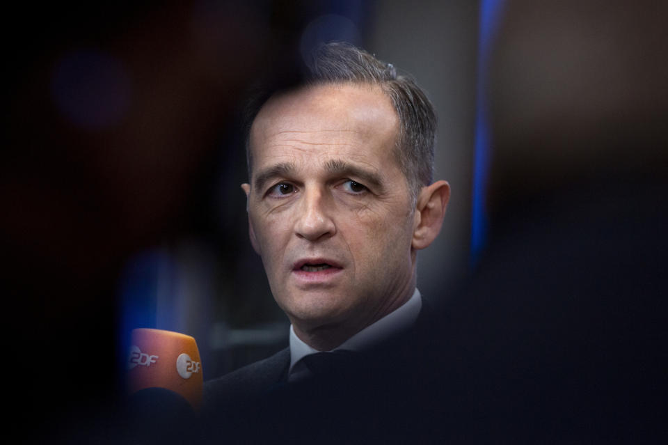 German Foreign Minister Heiko Maas arrives for a meeting of EU foreign ministers at the Europa building in Brussels, Monday, Jan. 20, 2020. EU foreign ministers meet in Brussels on Monday to discuss the situation in Libya and Venezuela, the deteriorating security and humanitarian situation in Sahel, and climate diplomacy. (AP Photo/Virginia Mayo)