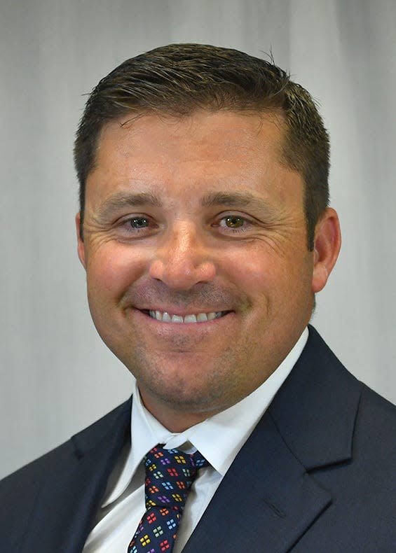 Gadsden State athletics director and baseball coach Blake Lewis