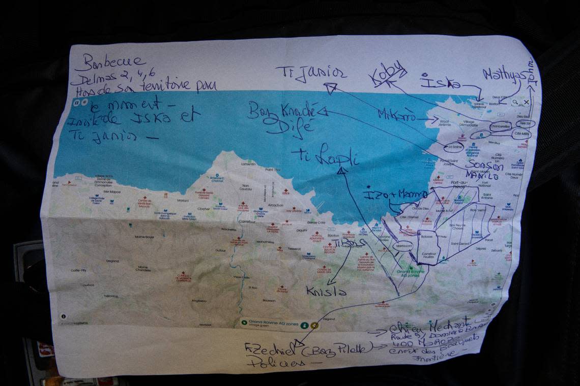 A map created by a businessman who asked not to be identified, notes the different territories controlled by gangs in Port-au-Prince, Haiti, Thursday, Oct. 7, 2021. Jimmy Cherizier, aka Barbecue, a former policeman who leads the G9 gang coalition, controls the coastal strip of Port-au-Prince.