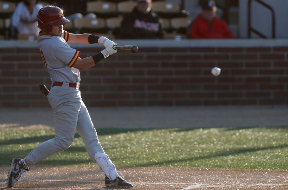 McCutcheon's Brody Zimmer hits the ball during a game against Lafayette Jeff at Loeb Stadium.