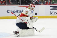 Florida Panthers goaltender Sergei Bobrovsky (72) stops the puck during the first period of an NHL hockey game against the Washington Capitals, Friday, Nov. 26, 2021, in Washington. (AP Photo/Nick Wass)