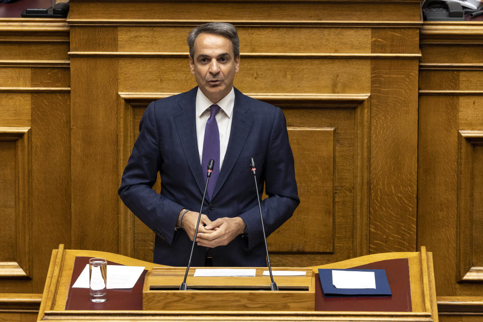 Greece's Prime Minister Kyriakos Mitsotakis addresses lawmakers during a parliament session in Athens, Greece, Saturday, July 8, 2023. The newly elected Greek government won a vote of confidence from the parliament, following a three-day debate. (AP Photo/Yorgos Karahalis)