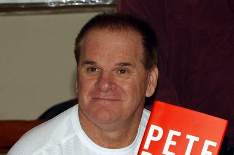 Former baseball player and manager Pete Rose banters with the media and signs copies of his new autobiography "My Prison Without Bars" on the first day of release, January 8, 2004, at Bookends in Ridgewood, N.J. On September 11, 1985, Rose's 4,192nd hit broke Ty Cobb's 57-year-old career Major League Baseball record. Rose finished his career with 4,256 hits. File Photo by Ezio Petersen/UPI