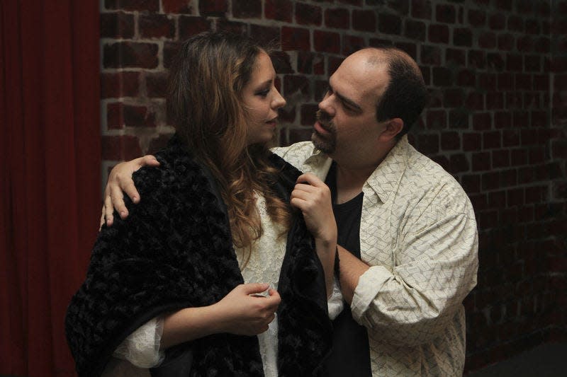 Christy Burgess, left, and Scot Shepley are shown rehearsing a scene for The Acting Ensemble Stage Company's production of David Ives' "Venus in Fur" that opens Friday at Studio 217 in South Bend. SBT Photo/ANDREW S. HUGHES  