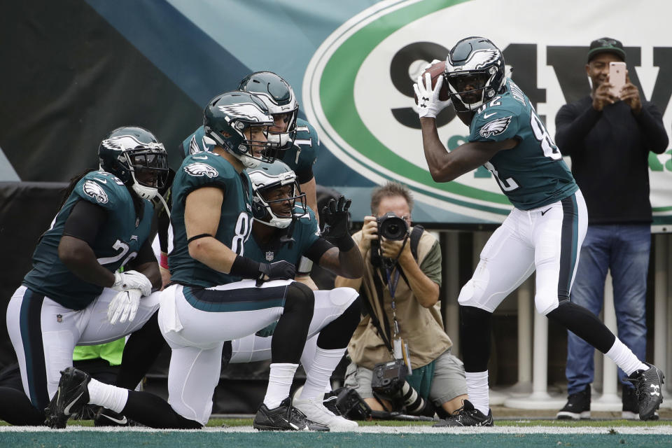 Philadelphia Eagles’ Torrey Smith, right, celebrates with teammates after scoring a touchdown during the first half against the Arizona Cardinals. (AP/Matt Rourke)