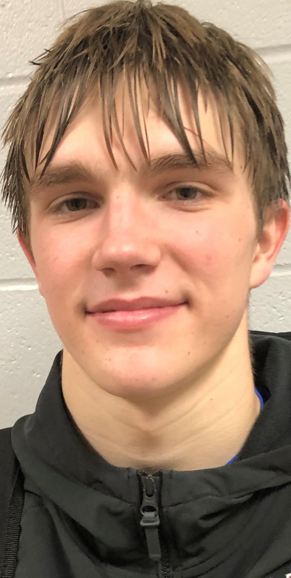 Newark senior Drew Oberholtzer grabbed a key offensive rebound, was fouled and made two foul shots, putting the Wildcats ahead for good in a 52-49 win at Olentangy Berlin.