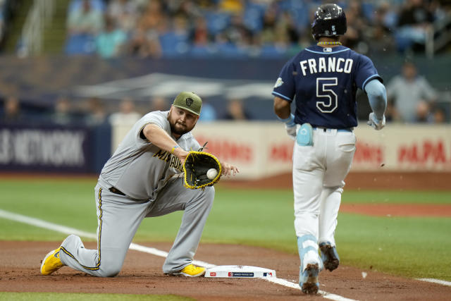Milwaukee Brewers first baseman Rowdy Tellez throws out Tampa Bay Rays' Wander Franco (5) at first base during the first inning of a baseball game Saturday, May 20, 2023, in St. Petersburg, Fla. (AP Photo/Chris O'Meara)