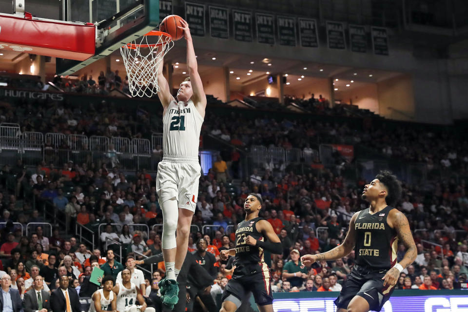 Miami forward Sam Waardenburg (21) scores during the second half of an NCAA college basketball game against Florida State on Saturday, Jan. 18, 2020, in Coral Gables, Fla. (AP Photo/Brynn Anderson)