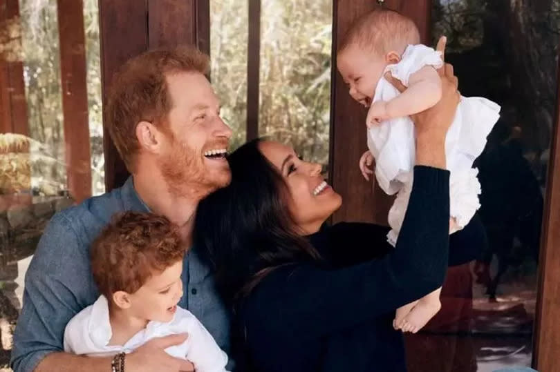 Prince Harry and Meghan Markle with kids Archie and Lilibet