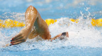 Jul 28, 2012; London, United Kingdom; Natalie Coughlin (USA) competes in her leg of a women's 4x100m freestyle relay heat during the 2012 London Olympic Games at Aquatics Centre. Mandatory Credit: Rob Schumacher-USA TODAY Sports
