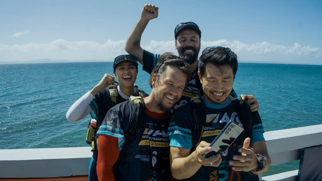 The cast of “Arthur the King” includes (from left) Nathalie Emmanuel as Olivia, Mark Wahlberg as Michael, Ali Suliman as Chik and Simu Liu as Leo. (Photo: Carlos Rodriguez)