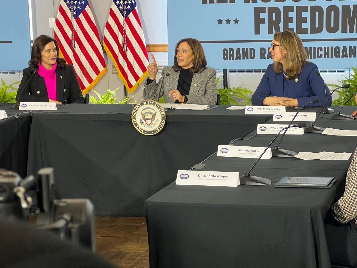 Vice President Kamala Harris (center) speaks as Gov. Gretchen Whitmer (left) and U.S. Rep. Hillary Scholten, D-Grand Rapids, look on during a roundtable discussion on abortion access on Thursday, Feb. 22, 2024, at Fountain Street Church in Grand Rapids, Mich.