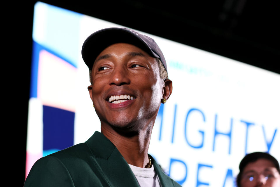 Pharrell Williams Wearing Green Blazer