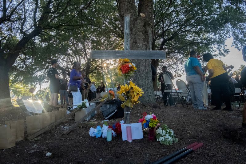 Mourners attend a prayer vigil in Jacksonville