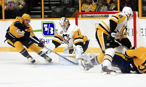 October 22, 2016: Nashville Predators defenseman Mattias Ekholm (14) tries to score on Pittsburgh Penguins goalie Mike Condon (1) during the NHL game between the Nashville Predators and the Pittsburgh Penguins, held at Bridgestone Arena in Nashville, Tennessee. (Photo by Danny Murphy/Icon Sportswire via Getty Images)