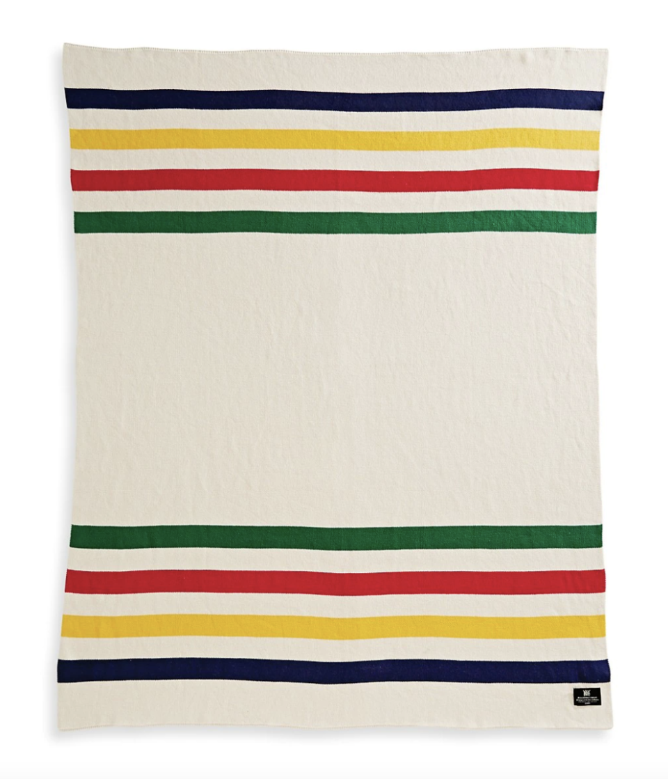 HBC Stripes Luxe Multistripe Cotton Knit Throw with navy, yellow, red, and green stripes