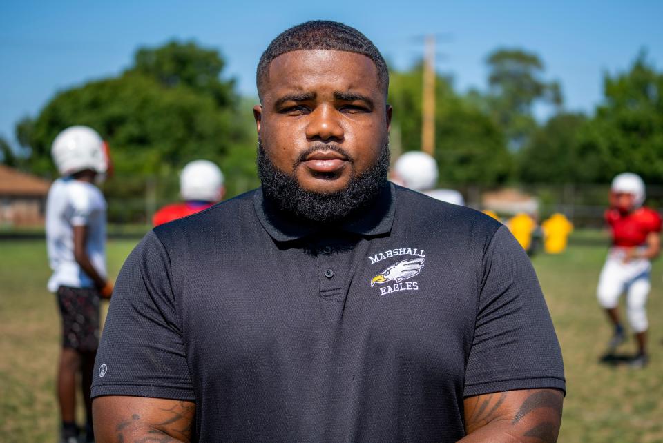 Head Coach of Milwaukee Marshall's football team Anthony Dowery poses for a photo on Wednesday August 10, 2022 at Milwaukee Marshall High School in Milwaukee, Wis. Jovanny Hernandez / Milwaukee Journal Sentinel